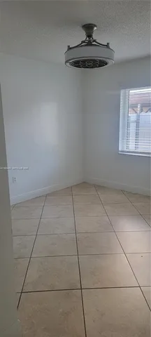 a bathroom with a shower and a toilet