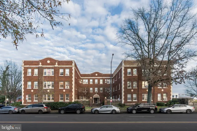 a view of a building and a street