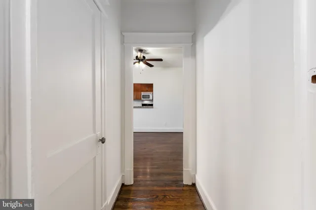 a kitchen with a stove and a microwave