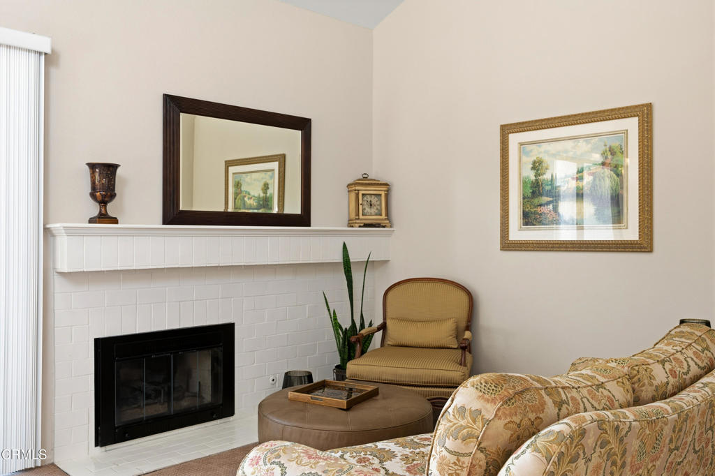 4427 Antigua Way Oxnard, CA 93035 - Photo 7 of 43 a living room with furniture and a fireplace