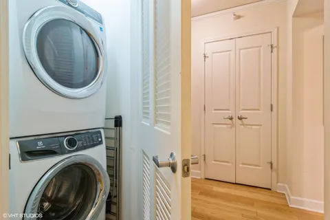 a view of a hallway with washer and dryer
