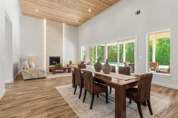 a view of a dining room with furniture window and outside view