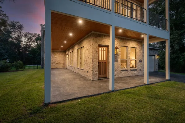 a view of a porch with a backyard