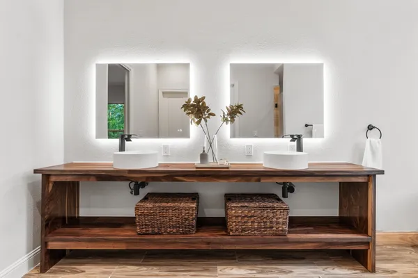 a view of living room with furniture and potted plant