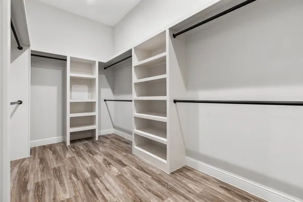 a view of an empty walk in closet