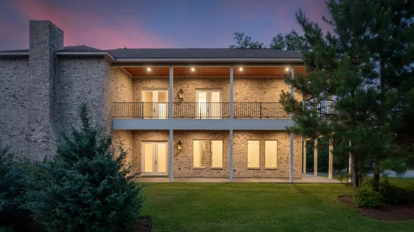 a large building with a big yard