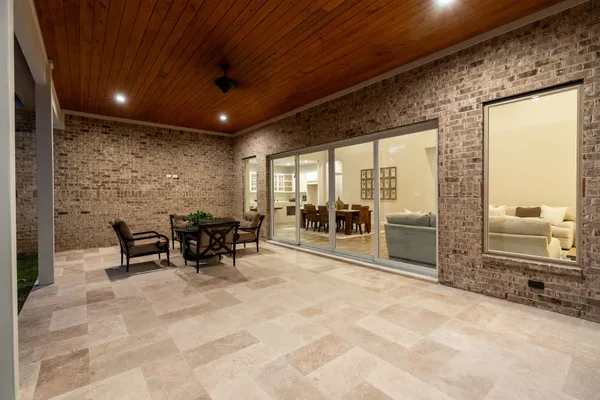 a view of a lobby with furniture and floor to ceiling window