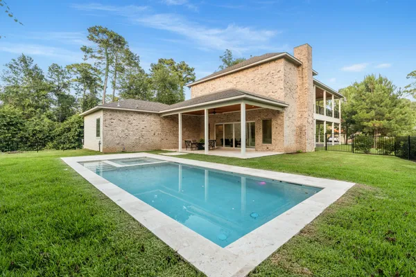 a view of outdoor space yard and swimming pool