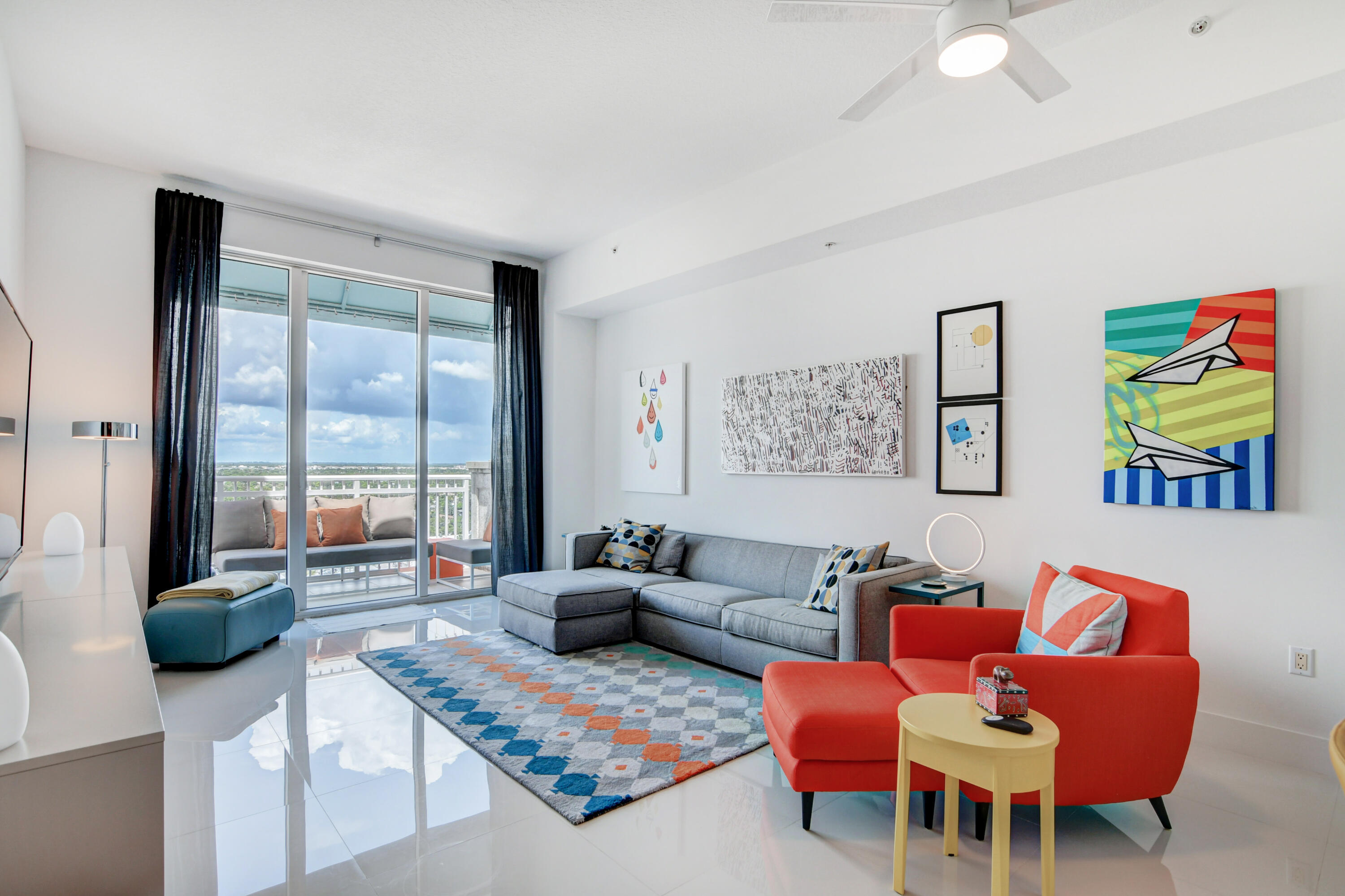 450 North Federal Highway, Unit PH03 Boynton Beach, FL 33435 - Photo 1 of 41 a living room with furniture and a large window
