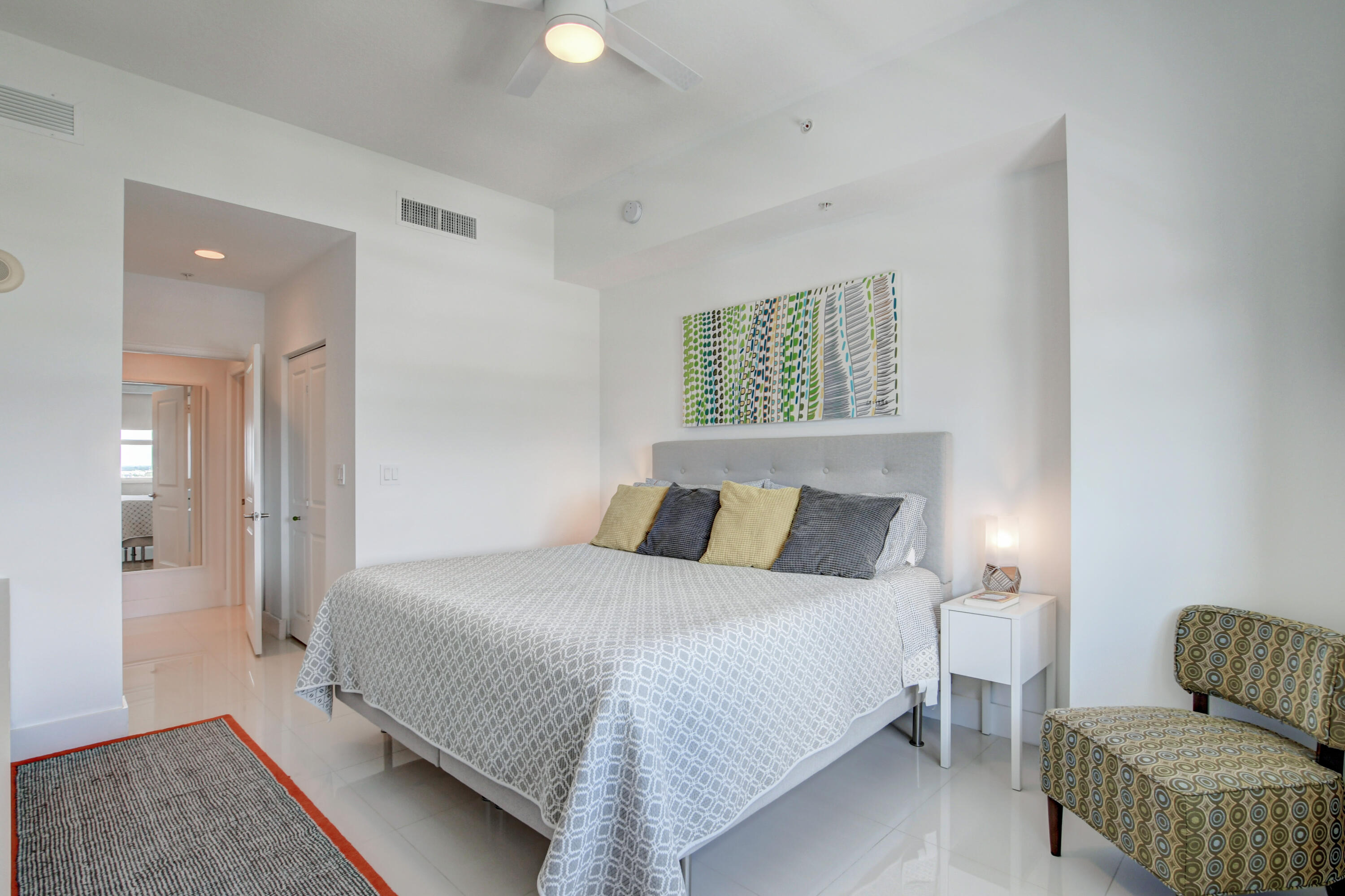 450 North Federal Highway, Unit PH03 Boynton Beach, FL 33435 - Photo 17 of 41 a bedroom with a bed and window