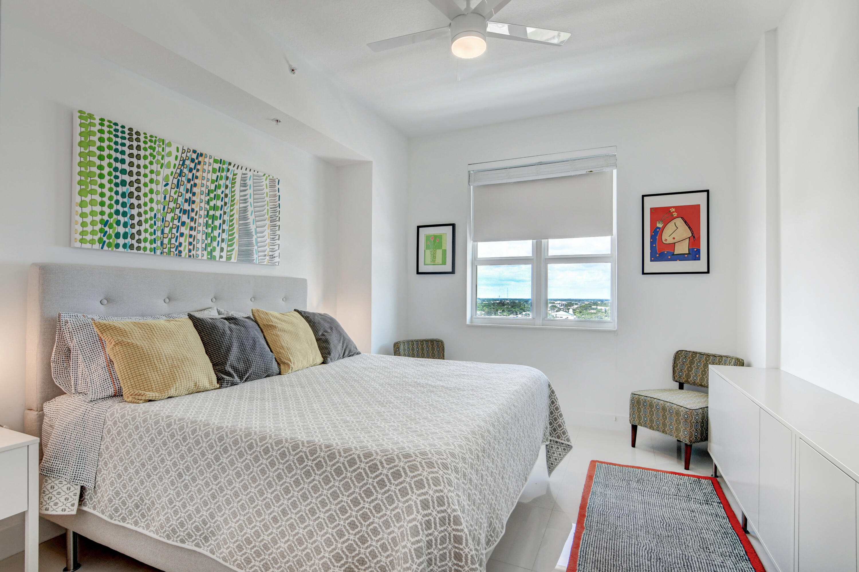 450 North Federal Highway, Unit PH03 Boynton Beach, FL 33435 - Photo 18 of 41 a bedroom with a bed and a window