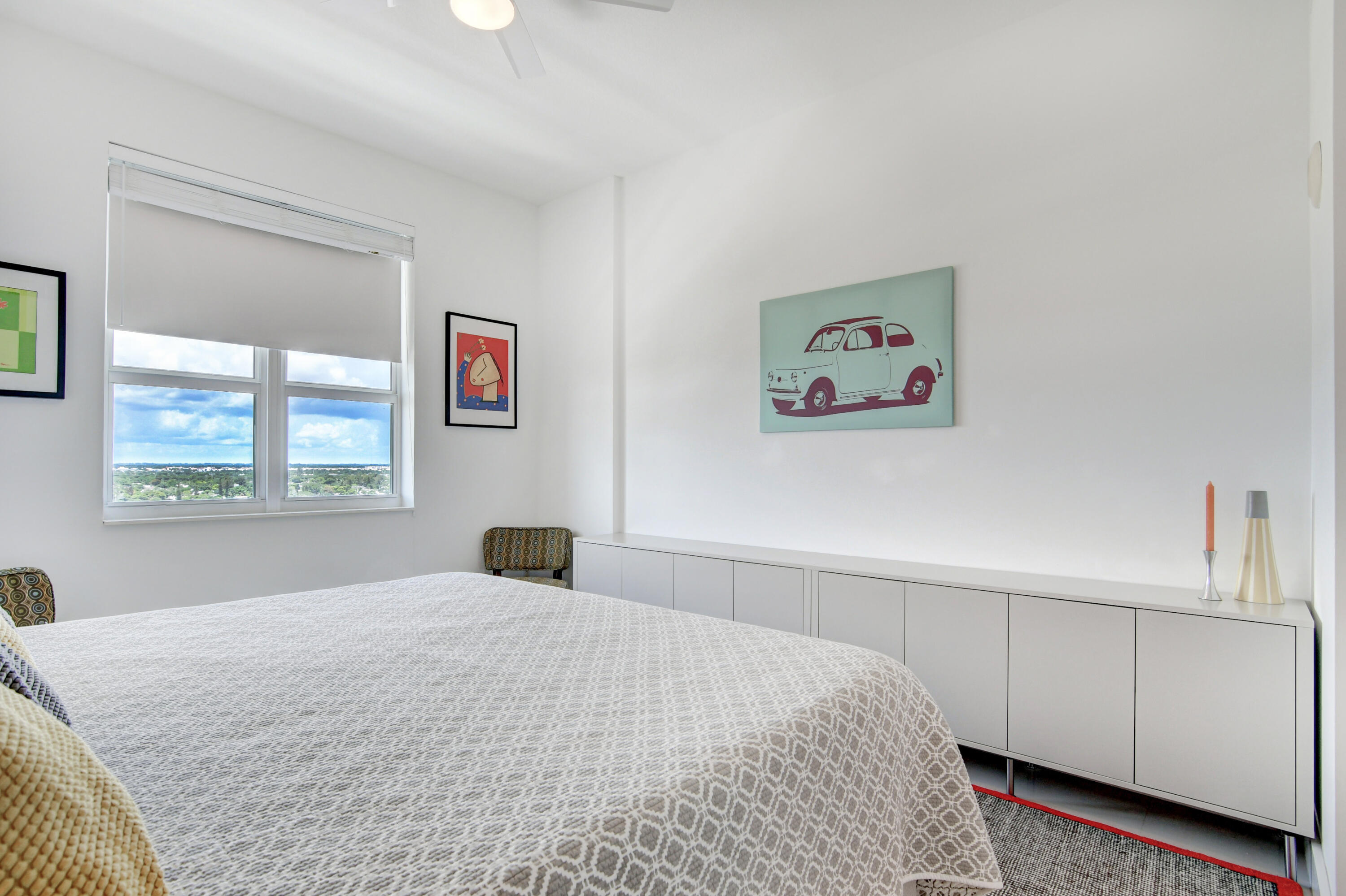 450 North Federal Highway, Unit PH03 Boynton Beach, FL 33435 - Photo 19 of 41 a bedroom with a large bed and a window