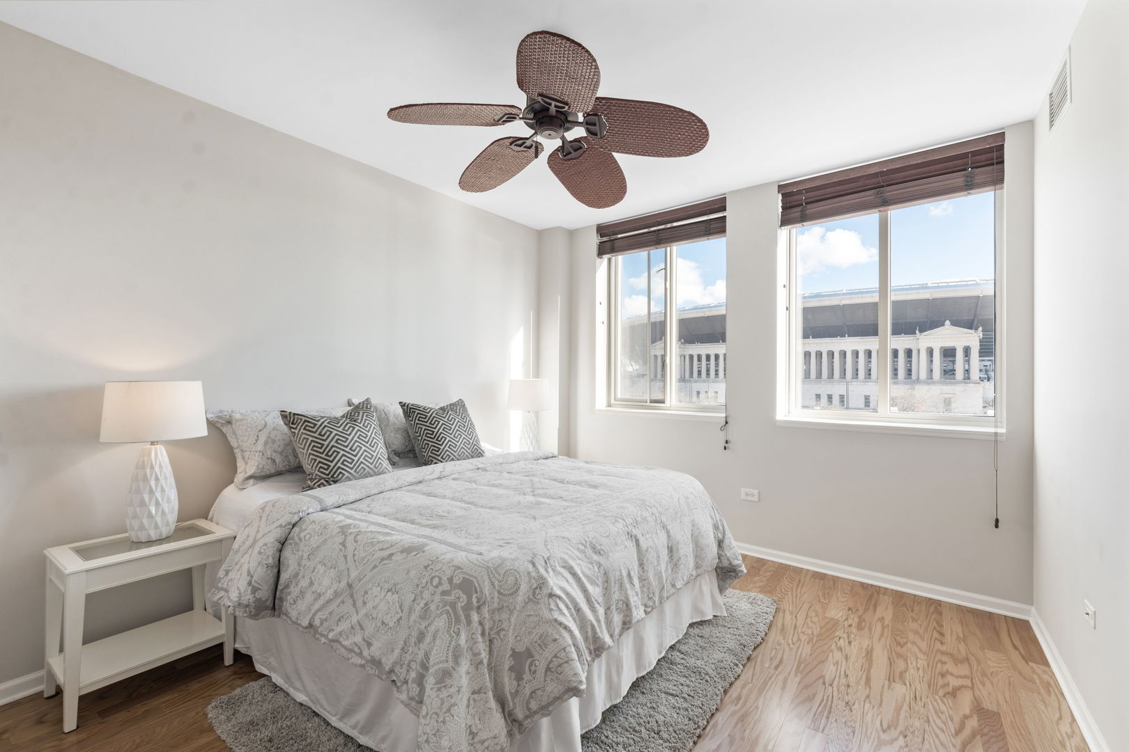 1515 South Prairie Avenue, Unit 508 Chicago, IL 60605 - Photo 9 of 22 a bedroom with a bed and a chandelier