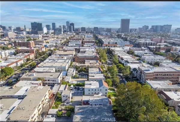 an aerial view of a city with lots of residential buildings
