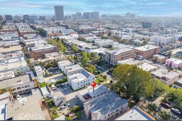 an aerial view of a city with lots of residential buildings
