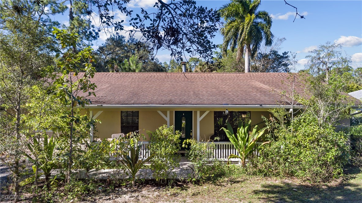 a house view with a garden space