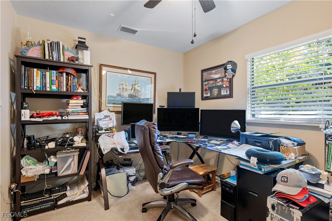 571 2nd Street Southeast Naples, FL 34117 - Photo 14 of 31 a work room with furniture and a window