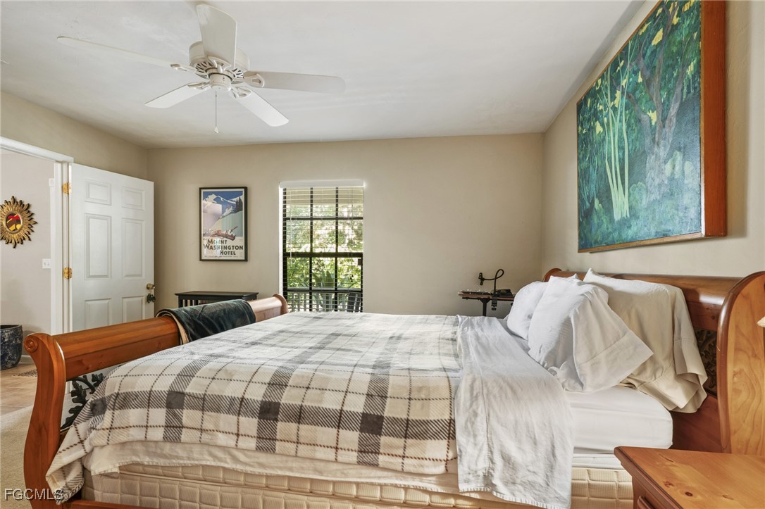 571 2nd Street Southeast Naples, FL 34117 - Photo 16 of 31 a bedroom with a bed and window