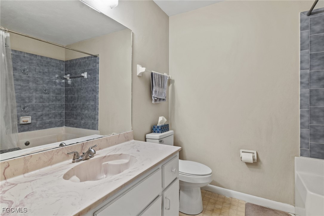 571 2nd Street Southeast Naples, FL 34117 - Photo 17 of 31 a bathroom with a sink toilet and shower