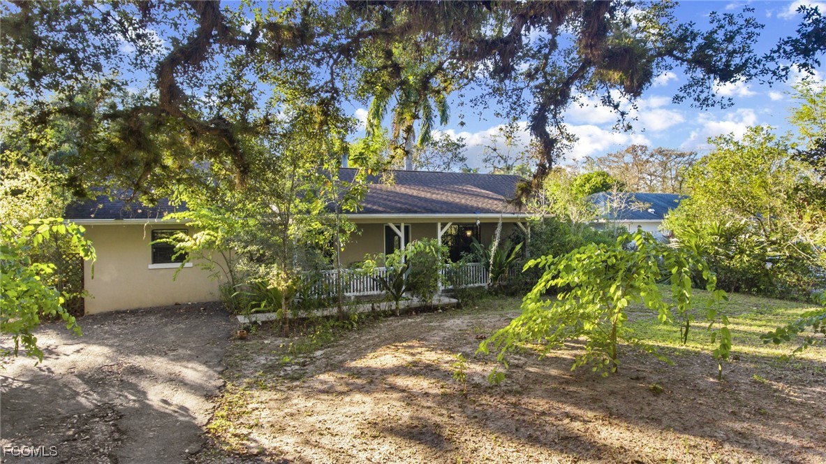 571 2nd Street Southeast Naples, FL 34117 - Photo 26 of 31 a view of outdoor space and yard