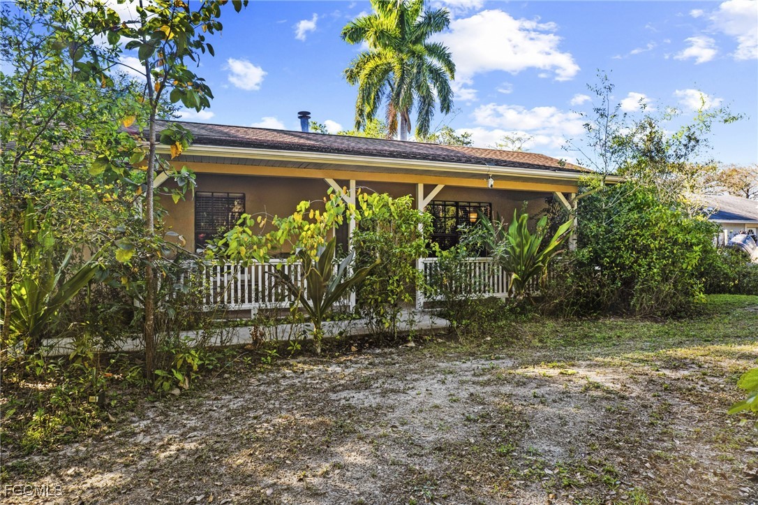 571 2nd Street Southeast Naples, FL 34117 - Photo 28 of 31 a view of house with a outdoor space