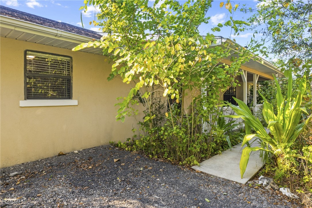 571 2nd Street Southeast Naples, FL 34117 - Photo 29 of 31 a view of a house with a tree