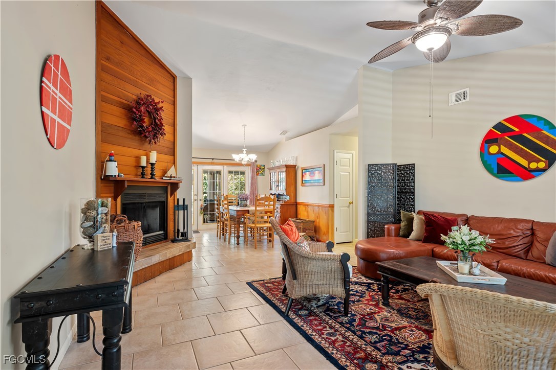 571 2nd Street Southeast Naples, FL 34117 - Photo 3 of 31 a living room with furniture and wooden floor