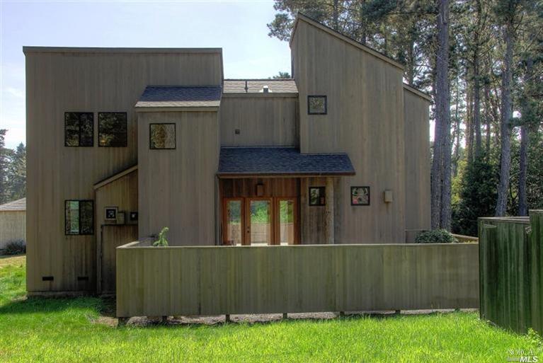 372 Pilots Reach The Sea Ranch, CA 95497 - Photo 1 of 1 a view of backyard with barbeque grill and wooden fence