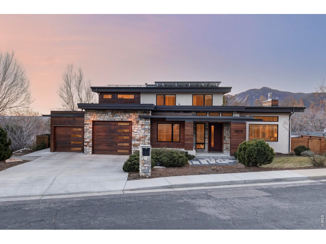 3875 Cloverleaf Drive Boulder, CO 80304 - Photo 6 of 6 a front view of a house with a yard