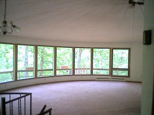 930-14 Decker Road Bushkill, PA 18324 - Photo 3 of 7 an empty room with windows