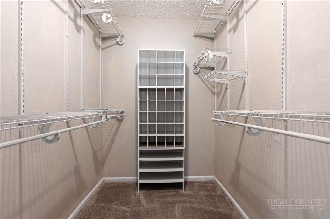 2345 Watauga River Road Sugar Grove, NC 28679 - Photo 20 of 50 a view of walk in closet with empty racks