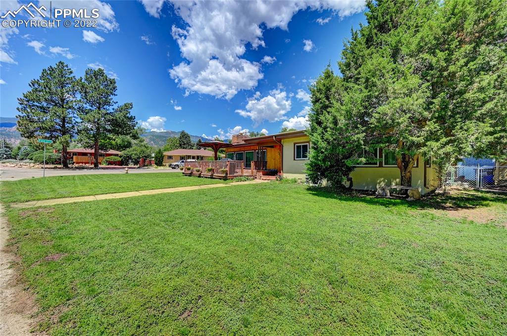 630 West Cheyenne Road Colorado Springs, CO 80906 - Photo 13 of 15 a view of a house with a big yard