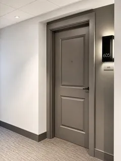 a view of a bedroom from a hallway