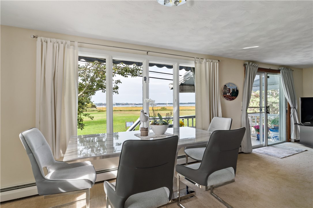 975 Anthony Road Portsmouth, RI 02871 - Photo 14 of 38 looking out to water from dining