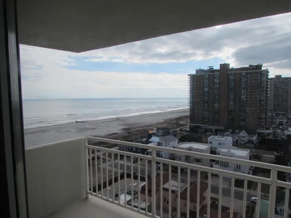 a view of city with ocean