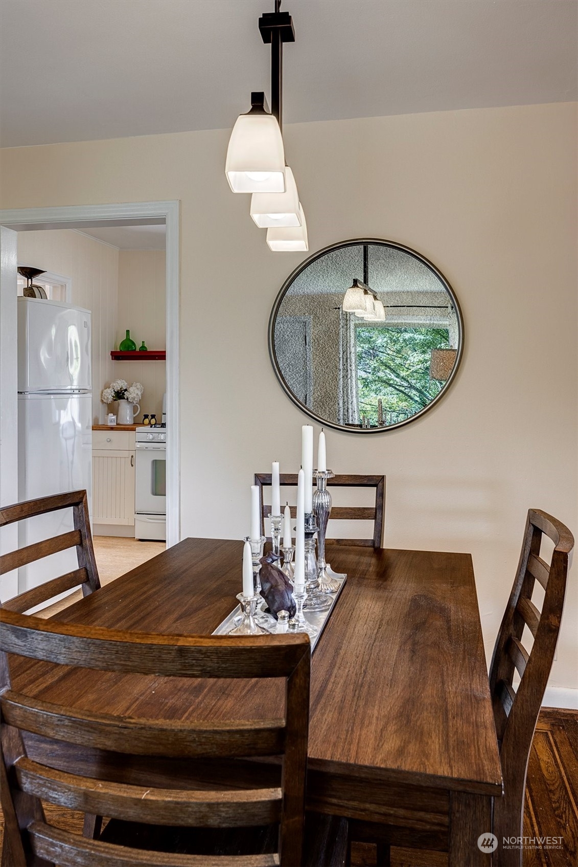 5051 40th Avenue Southwest Seattle, WA 98136 - Photo 12 of 40 a dining room with wooden floor table and chairs
