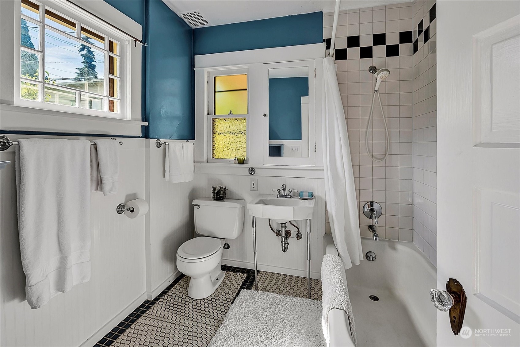 5051 40th Avenue Southwest Seattle, WA 98136 - Photo 23 of 40 a bathroom with a sink and toilet