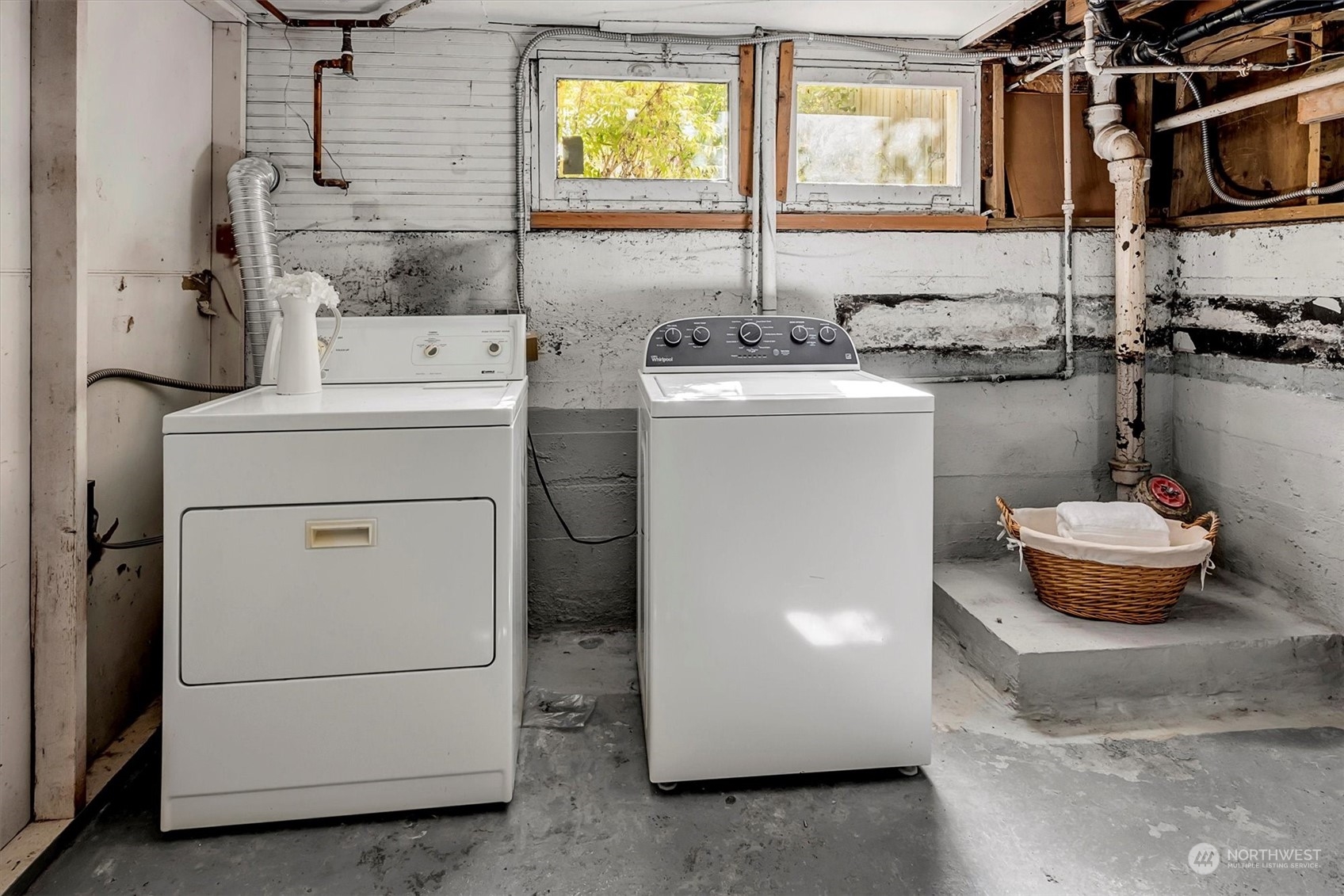 5051 40th Avenue Southwest Seattle, WA 98136 - Photo 29 of 40 a utility room with dryer and washer