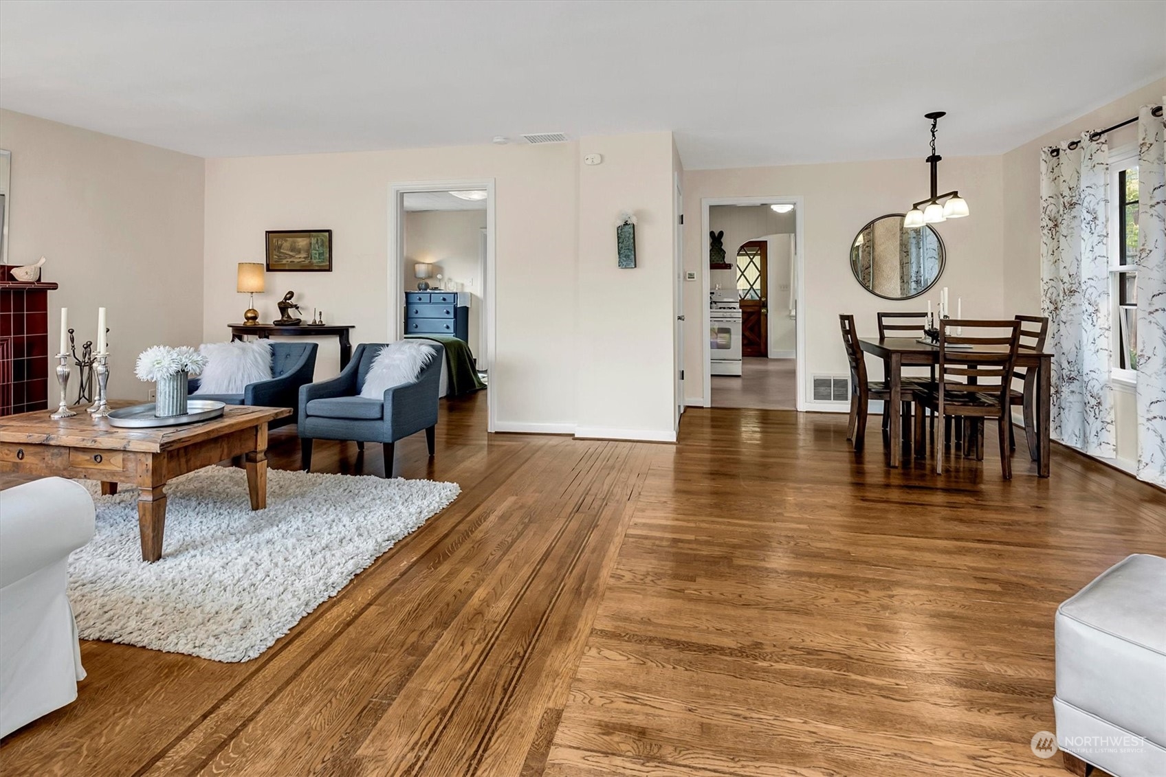 5051 40th Avenue Southwest Seattle, WA 98136 - Photo 3 of 40 a living room with furniture and a wooden floor