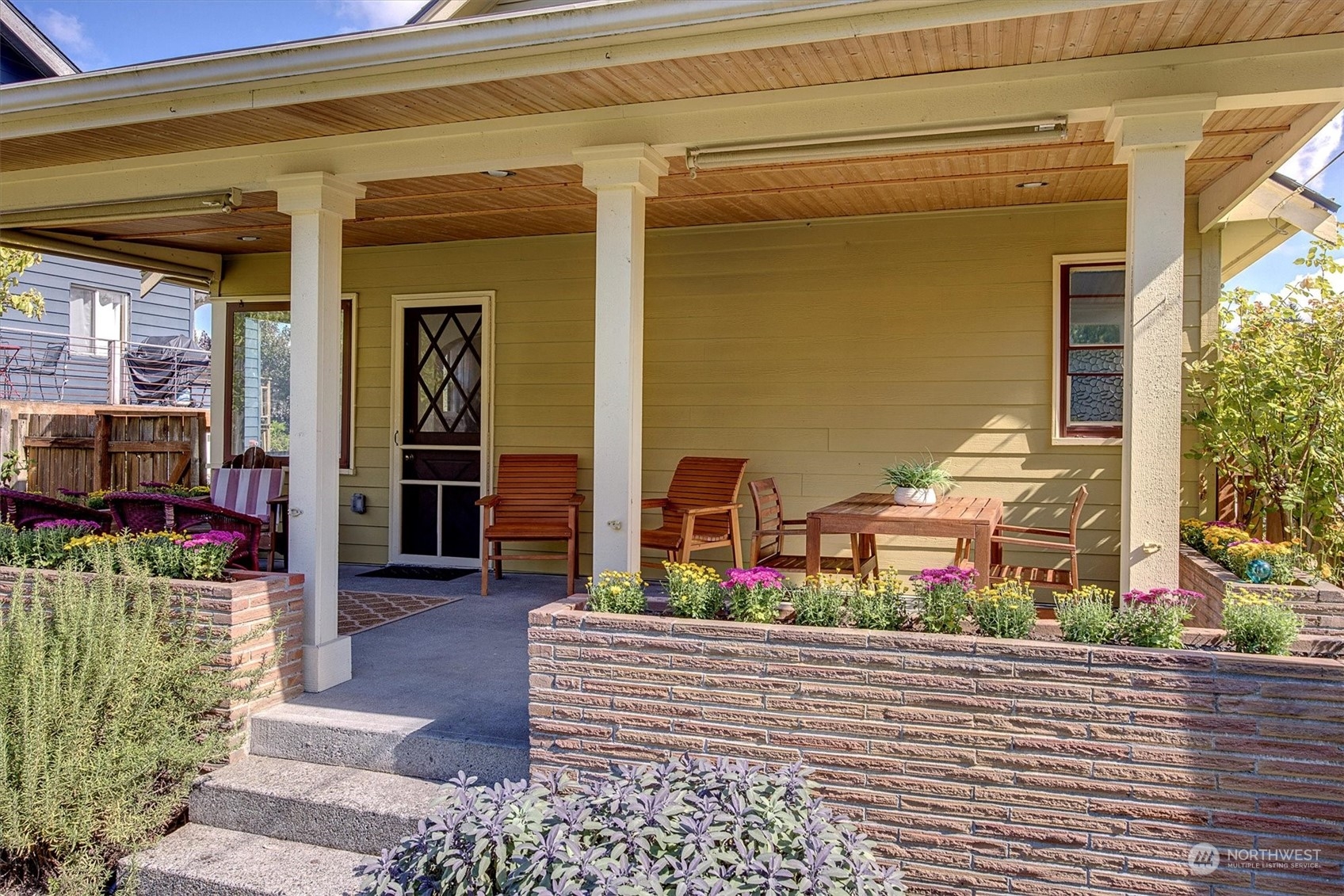 5051 40th Avenue Southwest Seattle, WA 98136 - Photo 31 of 40 a front view of a house with an outdoor space