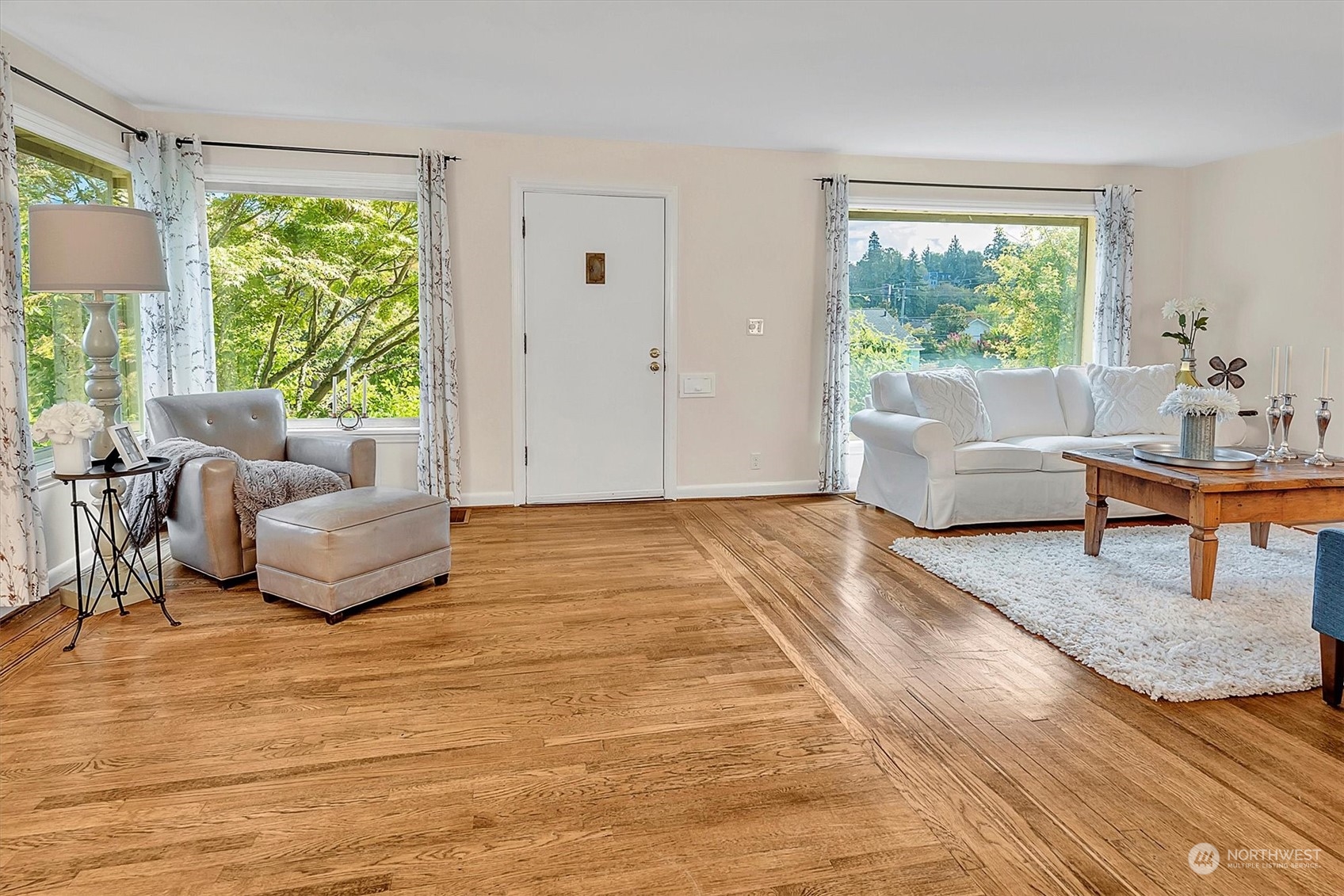 5051 40th Avenue Southwest Seattle, WA 98136 - Photo 10 of 40 a living room with furniture and a large window