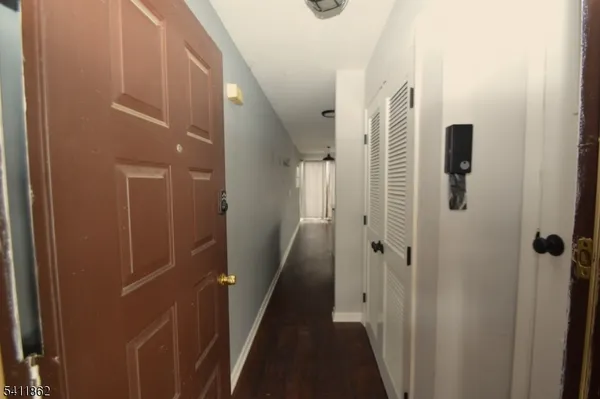 a kitchen with a sink and a refrigerator