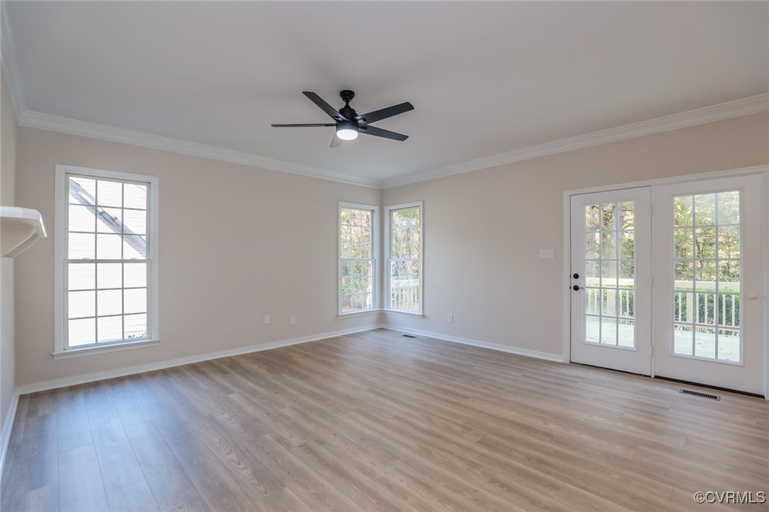 14900 Sandstone Ridge Court Midlothian, VA 23112 - Photo 20 of 50 a view of empty room with wooden floor and fan