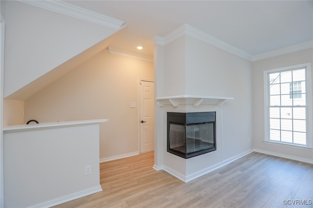 14900 Sandstone Ridge Court Midlothian, VA 23112 - Photo 22 of 50 a view of an empty room with wooden floor and a window