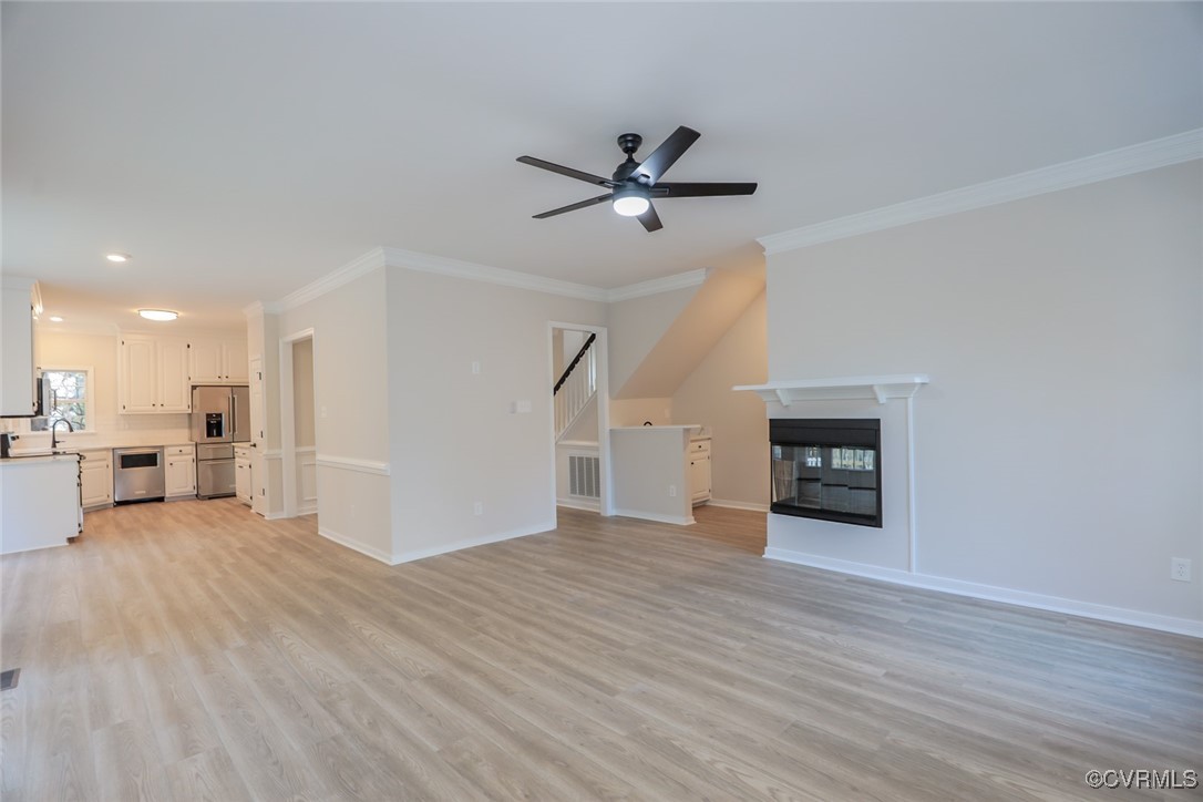 14900 Sandstone Ridge Court Midlothian, VA 23112 - Photo 23 of 50 a view of empty room with wooden floor and fireplace