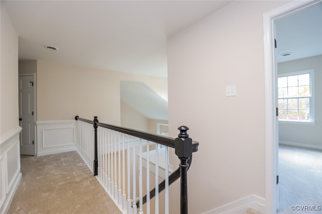 14900 Sandstone Ridge Court Midlothian, VA 23112 - Photo 26 of 50 a view of a hallway with a window and stairs