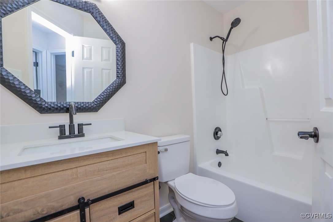 14900 Sandstone Ridge Court Midlothian, VA 23112 - Photo 41 of 50 a bathroom with a sink a toilet and a mirror