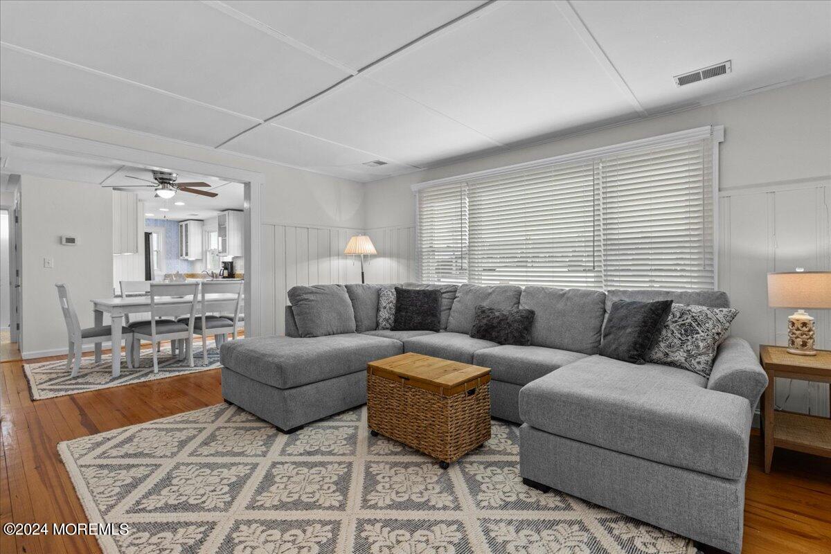 51 3rd Avenue Lavallette, NJ 08735 - Photo 13 of 36 a living room with furniture and a large window