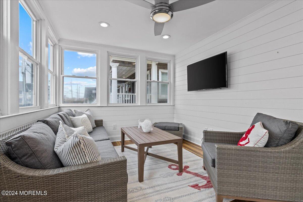 51 3rd Avenue Lavallette, NJ 08735 - Photo 30 of 36 a living room with furniture and a flat screen tv