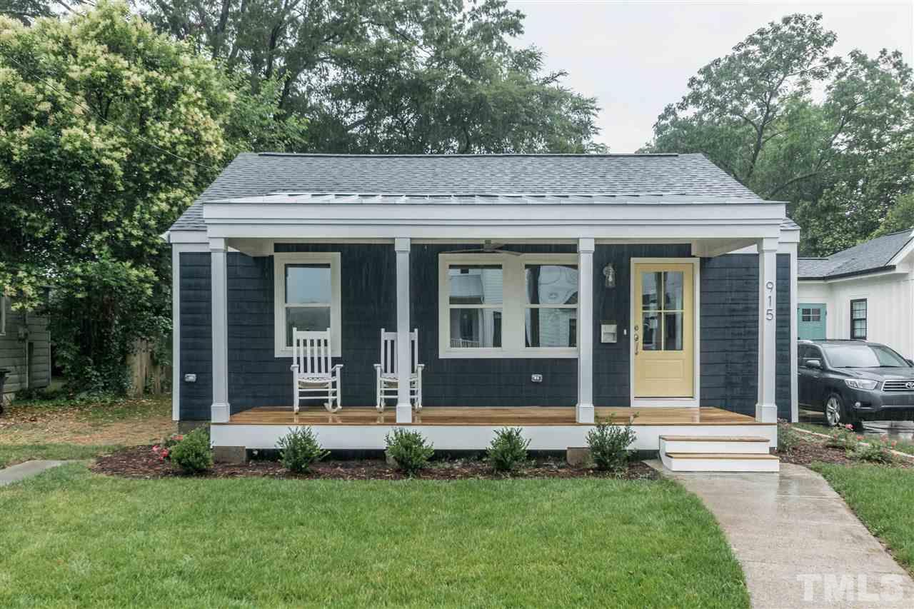 915 Elm Street Raleigh, NC 27604 - Photo 1 of 25 a front view of a house with a garden